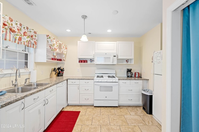 kitchen featuring white cabinetry, white appliances, decorative light fixtures, and sink