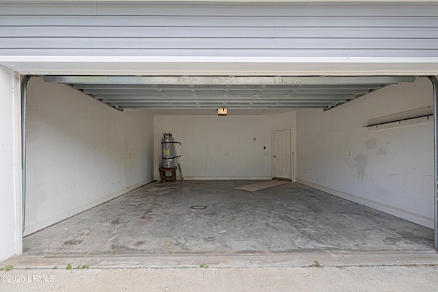 4 Applemint Ln, Beaufort, SC 29906 - garage with a garage door opener and a central vacuum unit