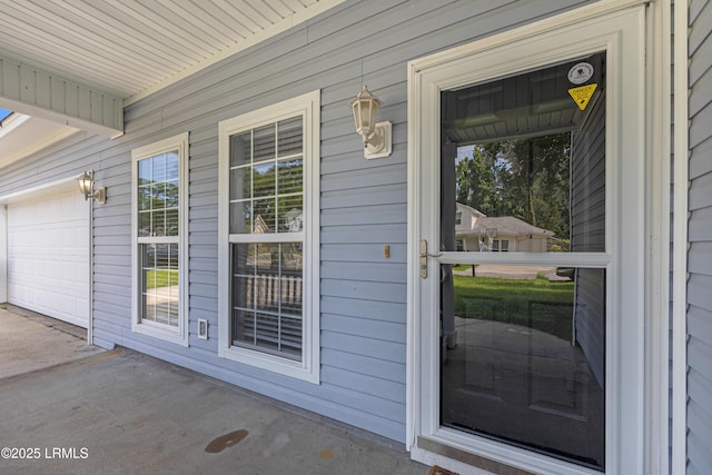 4 Applemint Ln, Beaufort, SC 29906 - view of exterior entry featuring a porch and concrete driveway