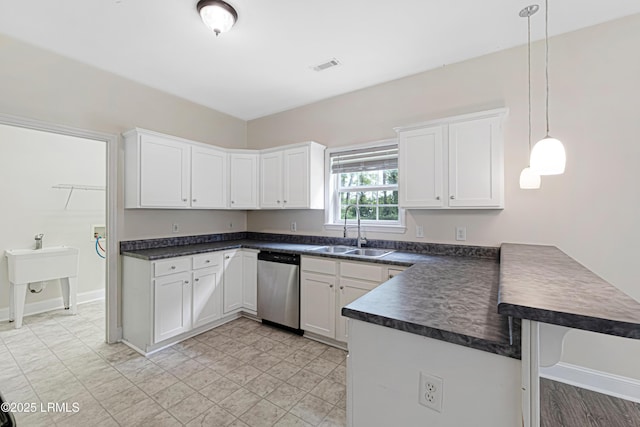 4 Applemint Ln, Beaufort, SC 29906 - kitchen featuring dishwasher, a peninsula, dark countertops, white cabinets, and pendant lighting