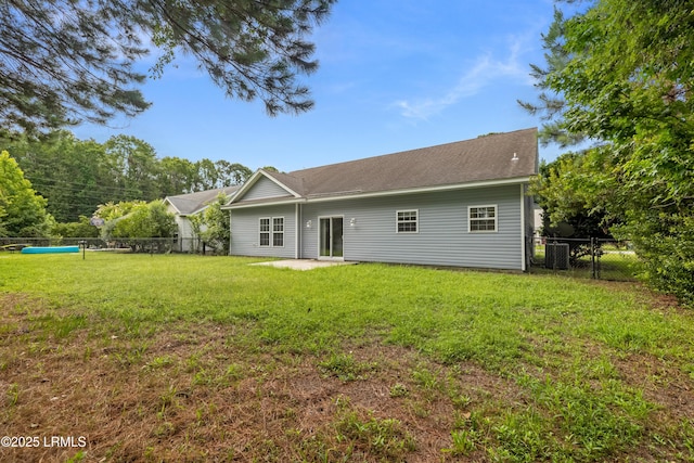 4 Applemint Ln, Beaufort, SC 29906 - back of house featuring a fenced backyard and a shingled roof