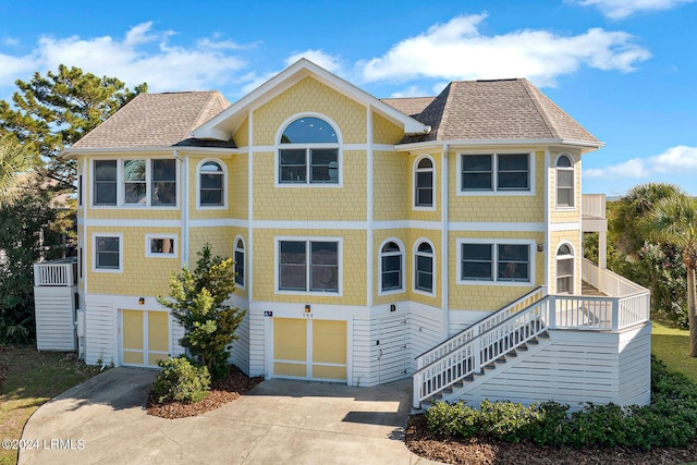 view of front of property with a garage