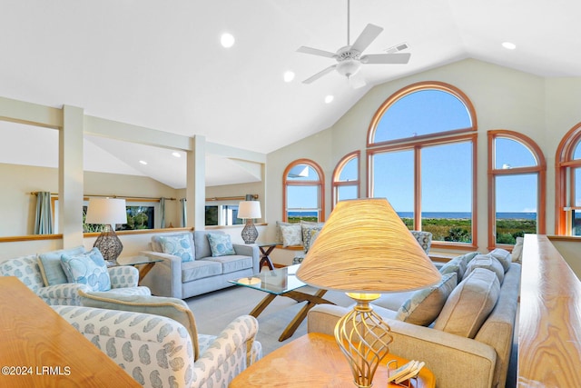 living room featuring vaulted ceiling and ceiling fan