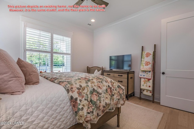 bedroom with crown molding, ceiling fan, and light wood-type flooring