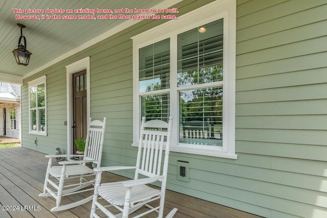 wooden deck with covered porch