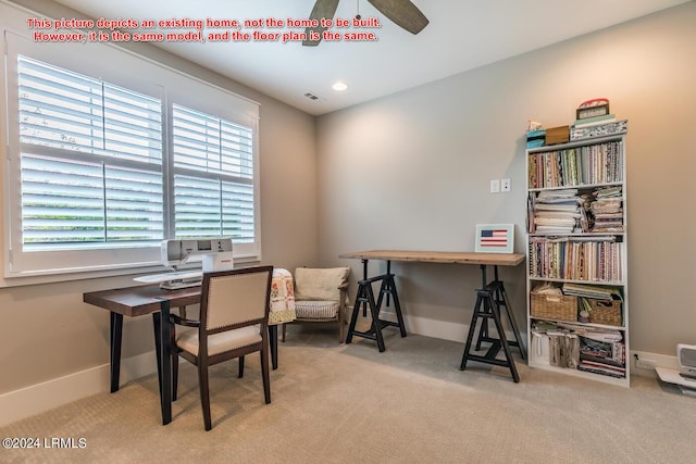 carpeted office space with ceiling fan