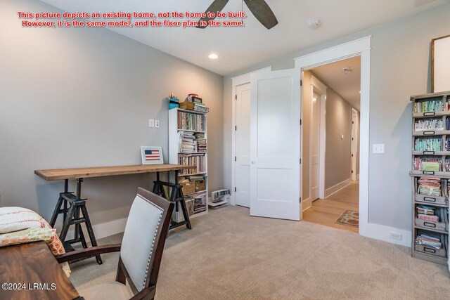 office featuring light colored carpet and ceiling fan