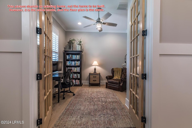 home office with ornamental molding, light hardwood / wood-style floors, french doors, and ceiling fan