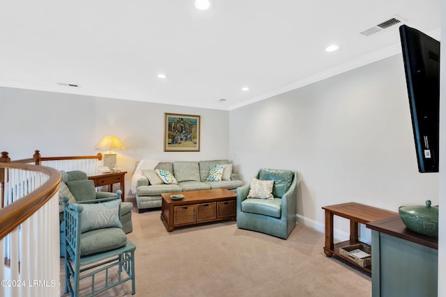 carpeted living room with crown molding