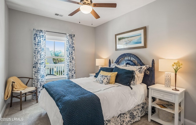 bedroom featuring ceiling fan and carpet floors