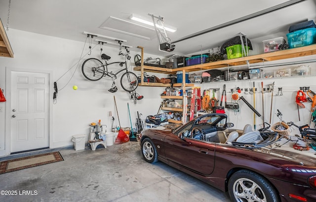 garage featuring a garage door opener