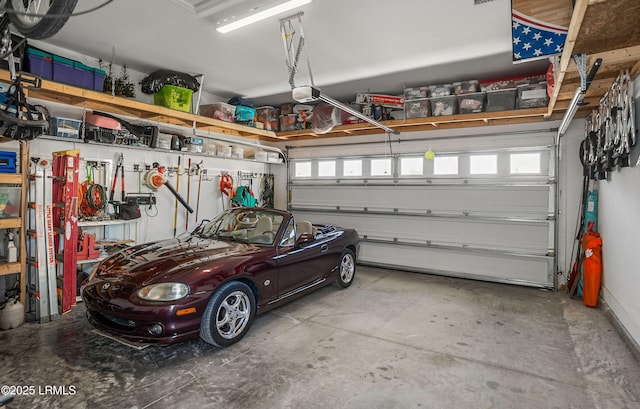 garage featuring a garage door opener