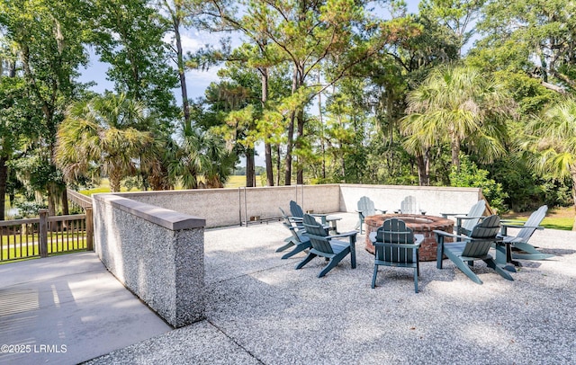 view of patio with an outdoor fire pit