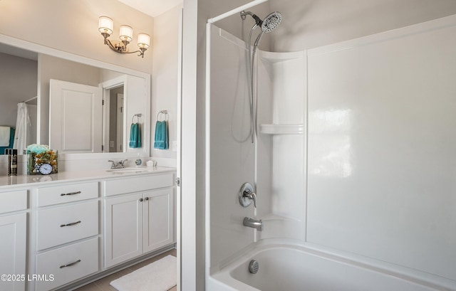 bathroom with vanity and shower / bathtub combination