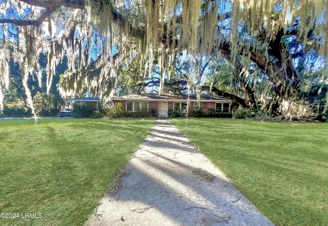 view of front of house with a front yard