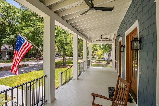 213 Old Plantation Dr W, Beaufort, SC 29907 - covered porch with a ceiling fan and a lawn