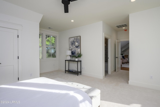 carpeted bedroom with ceiling fan