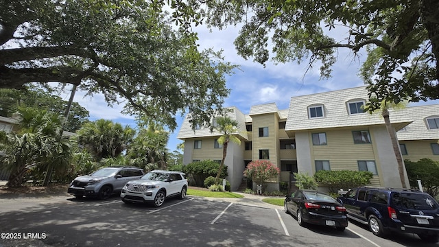 159 Beach Club Villa Dr Unit 159, Fripp Island, SC 29920 - view of property featuring uncovered parking