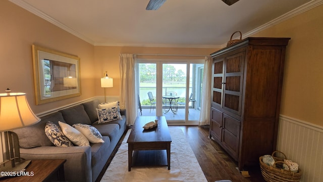 159 Beach Club Villa Dr Unit 159, Fripp Island, SC 29920 - living area featuring dark wood-style floors, ornamental molding, and wainscoting