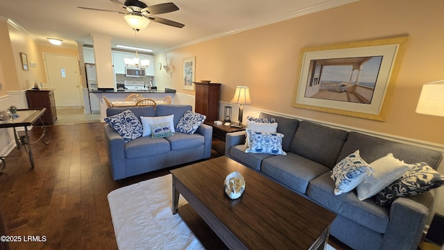 159 Beach Club Villa Dr Unit 159, Fripp Island, SC 29920 - living area with ornamental molding, a ceiling fan, a chandelier, and dark wood-style floors