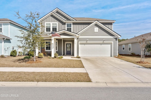 view of front of house featuring board and batten siding and concrete driveway