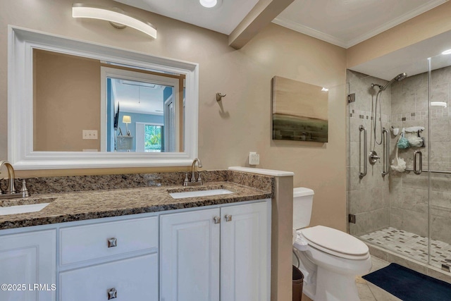 bathroom with walk in shower, ornamental molding, vanity, and toilet