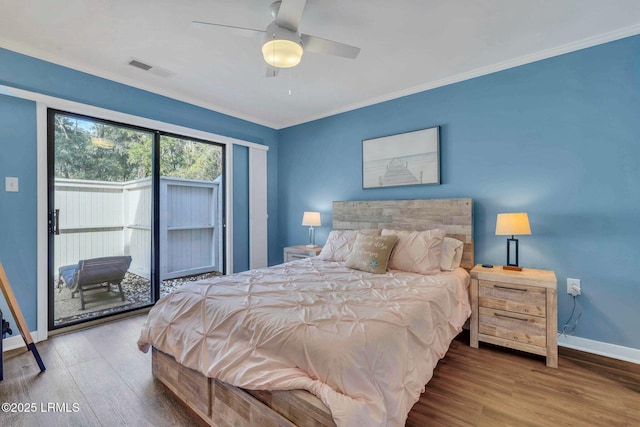 bedroom with crown molding, ceiling fan, hardwood / wood-style floors, and access to outside