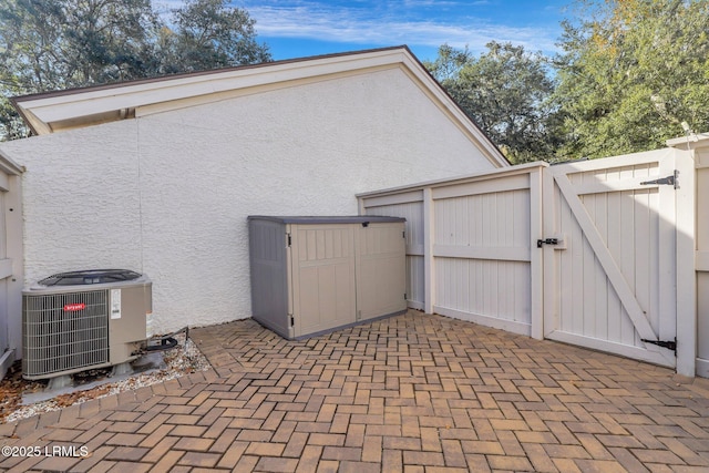 exterior space featuring central air condition unit