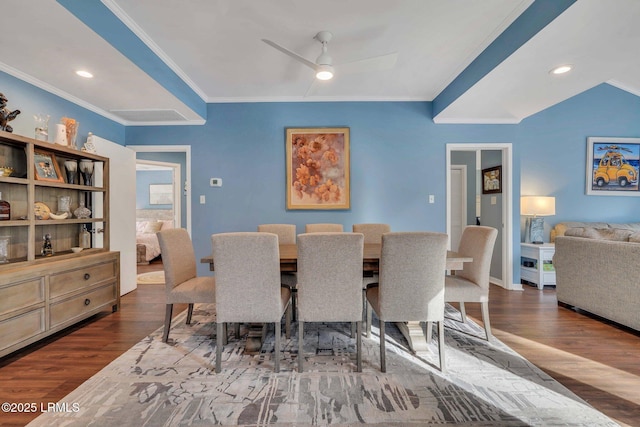 dining space featuring ornamental molding, dark hardwood / wood-style floors, and ceiling fan