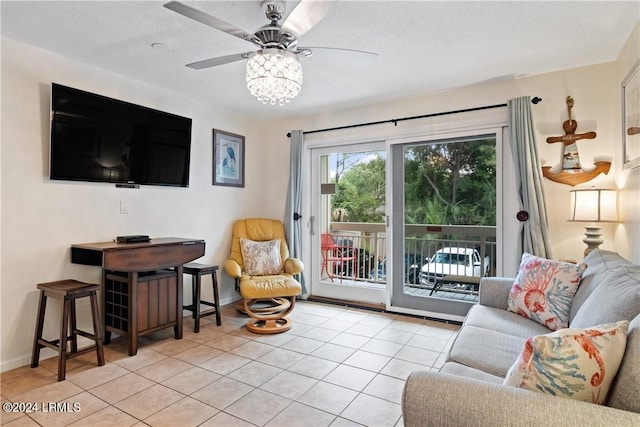 tiled living room with ceiling fan