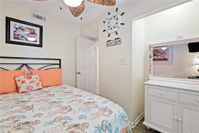 bedroom featuring hardwood / wood-style floors and ceiling fan