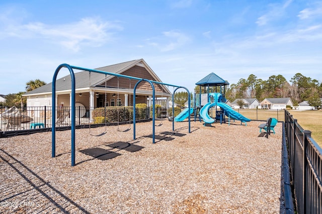 communal playground featuring fence