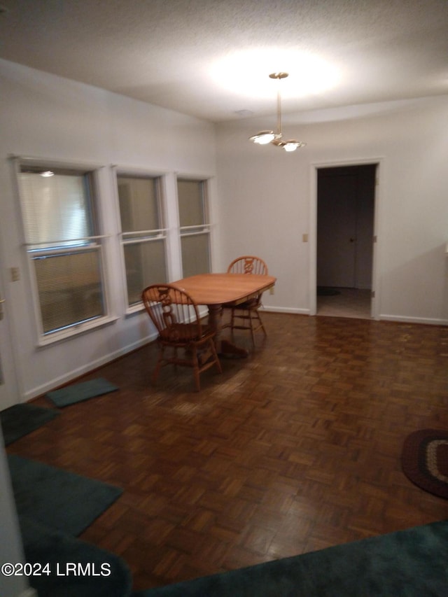 dining space featuring baseboards