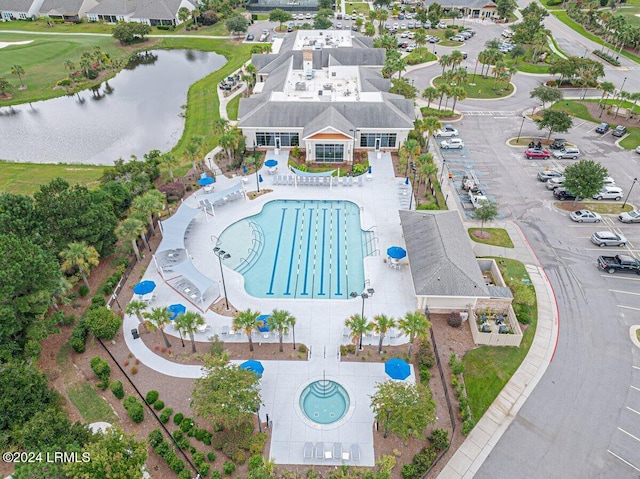 drone / aerial view with a water view