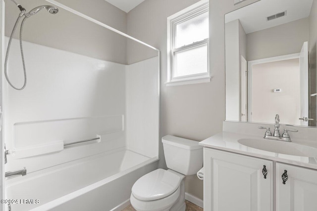 full bathroom with vanity, bathing tub / shower combination, and toilet