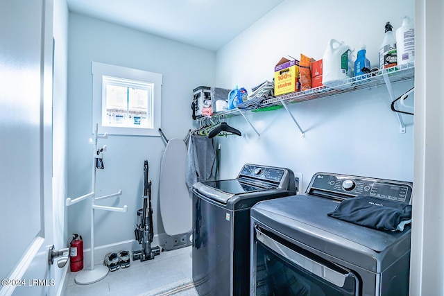 laundry area with washer and dryer