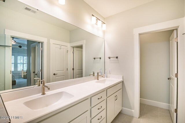 bathroom with vanity and tile patterned floors