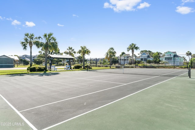 view of sport court featuring fence and community basketball court