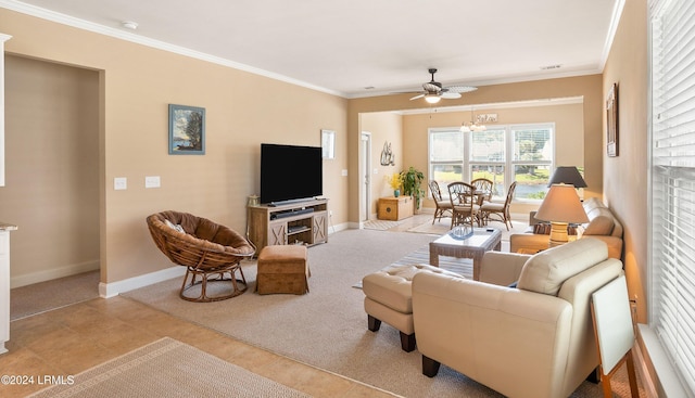 living room featuring crown molding, light colored carpet, and ceiling fan with notable chandelier