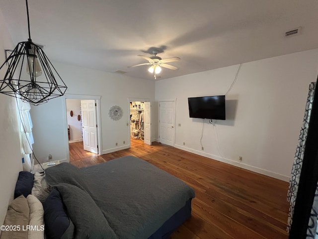 3769 Rice Shire Rd, Ridgeland, SC 29936 - bedroom with hardwood / wood-style floors, ensuite bathroom, and a ceiling fan