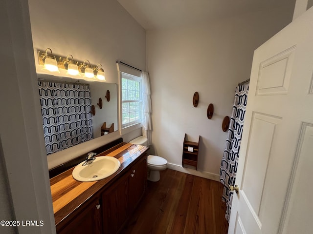 3769 Rice Shire Rd, Ridgeland, SC 29936 - full bath featuring vanity, wood finished floors, and curtained shower
