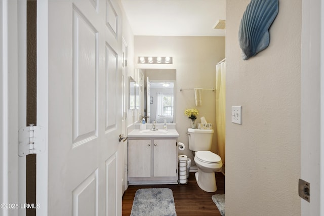 897 Fording Island Rd Unit 2708, Bluffton, SC 29910 - full bath featuring wood finished floors, vanity, toilet, and curtained shower
