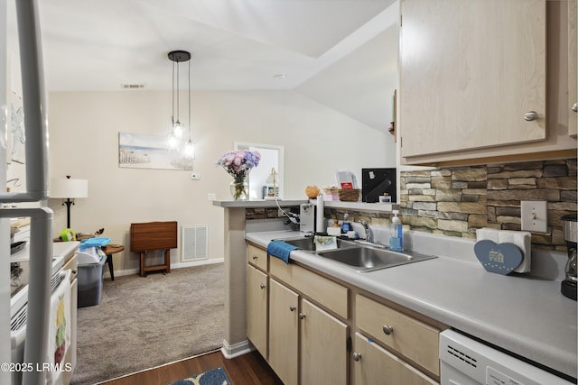 897 Fording Island Rd Unit 2708, Bluffton, SC 29910 - kitchen with dishwasher, light brown cabinets, a sink, light countertops, and lofted ceiling