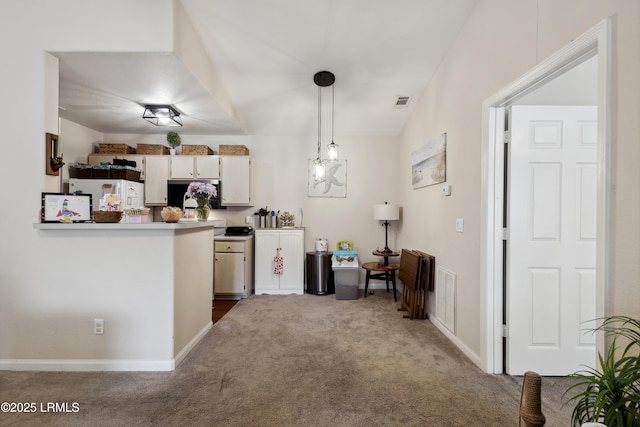 897 Fording Island Rd Unit 2708, Bluffton, SC 29910 - kitchen featuring carpet flooring, white fridge, pendant lighting, and light countertops