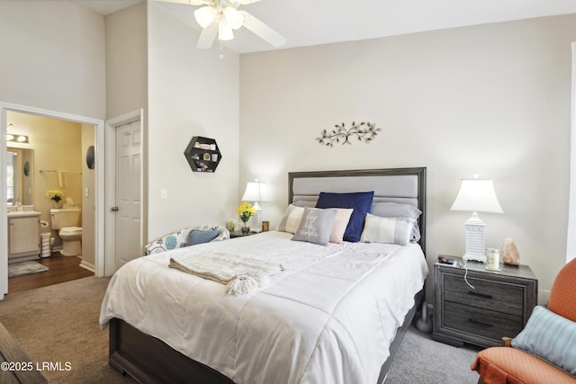 897 Fording Island Rd Unit 2708, Bluffton, SC 29910 - carpeted bedroom featuring a sink, connected bathroom, and a towering ceiling