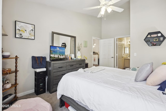 897 Fording Island Rd Unit 2708, Bluffton, SC 29910 - carpeted bedroom featuring connected bathroom, baseboards, ceiling fan, and high vaulted ceiling