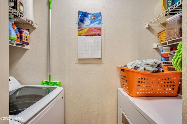 897 Fording Island Rd Unit 2708, Bluffton, SC 29910 - washroom with washer and dryer and a textured wall