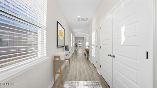 1449 Sanctum St, Ridgeland, SC 29936 - hall featuring wood finished floors, recessed lighting, and baseboards
