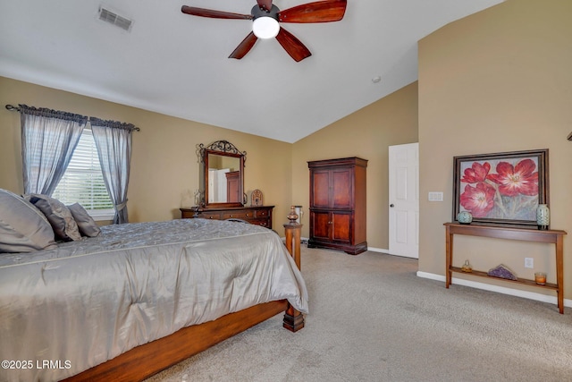 carpeted bedroom with ceiling fan and lofted ceiling