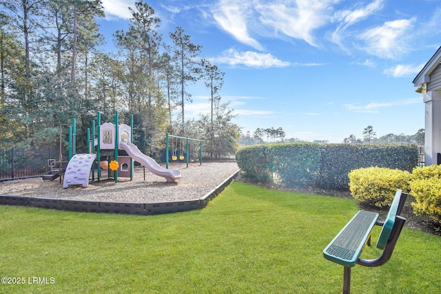 view of playground featuring a lawn